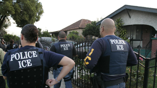 Immigration and Customs Enforcement agents on a raid in Los Angeles. (Credit: Allen J. Schaben / Los Angeles Times)