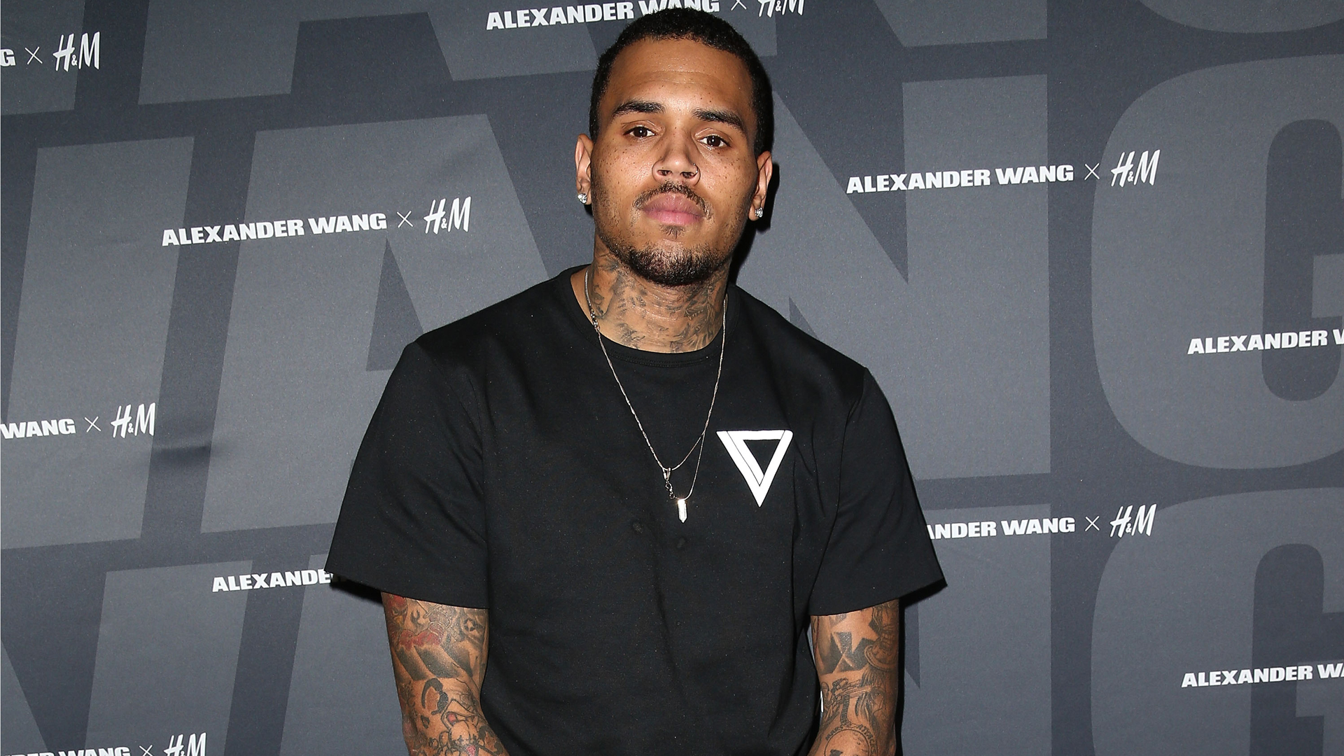 Recording artist Chris Brown attends the Alexander Wang x H&M Pre-Shop Party at H&M on Nov. 5, 2014 in West Hollywood. (Credit: Imeh Akpanudosen/Getty Images for H&M)