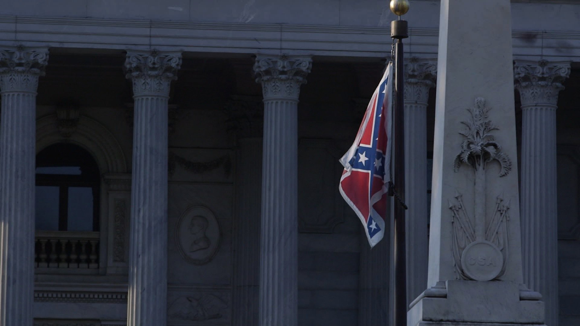 The Confederate battle flag flies near the South Carolina State Capitol building in Columbia in this file image. (Credit: CNN)