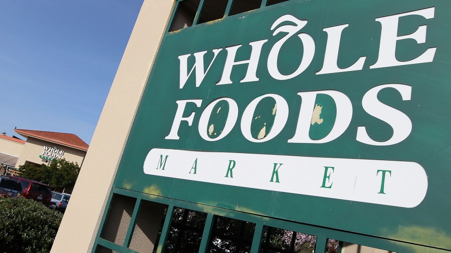 A Whole Foods Market sign is seen in a file photo. (Credit: Justin Sullivan/Getty Images)