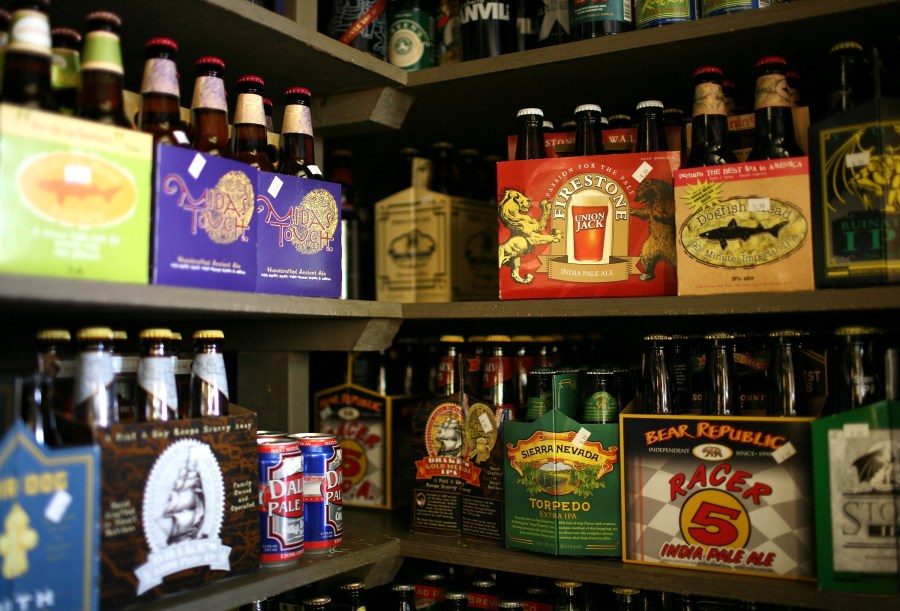 Six packs and single bottles of beer are displayed on a shelf at the City Beer Store May 20, 2009, in San Francisco. (Credit: Justin Sullivan/Getty Images)