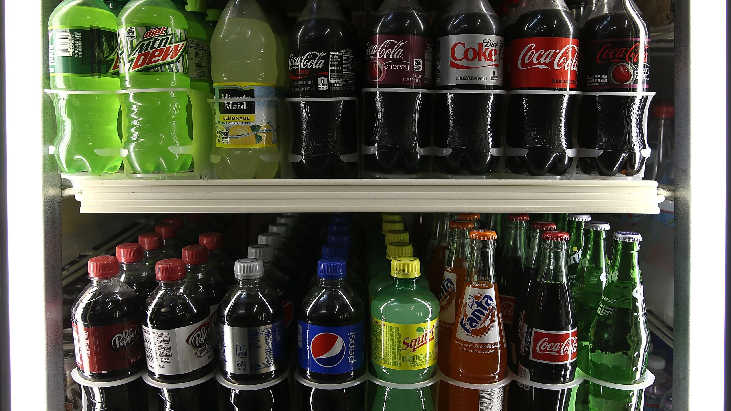 Bottles of soda are displayed in a cooler at a convenience store on June 10, 2015, in San Francisco, California. (Credit: Justin Sullivan/Getty Images)