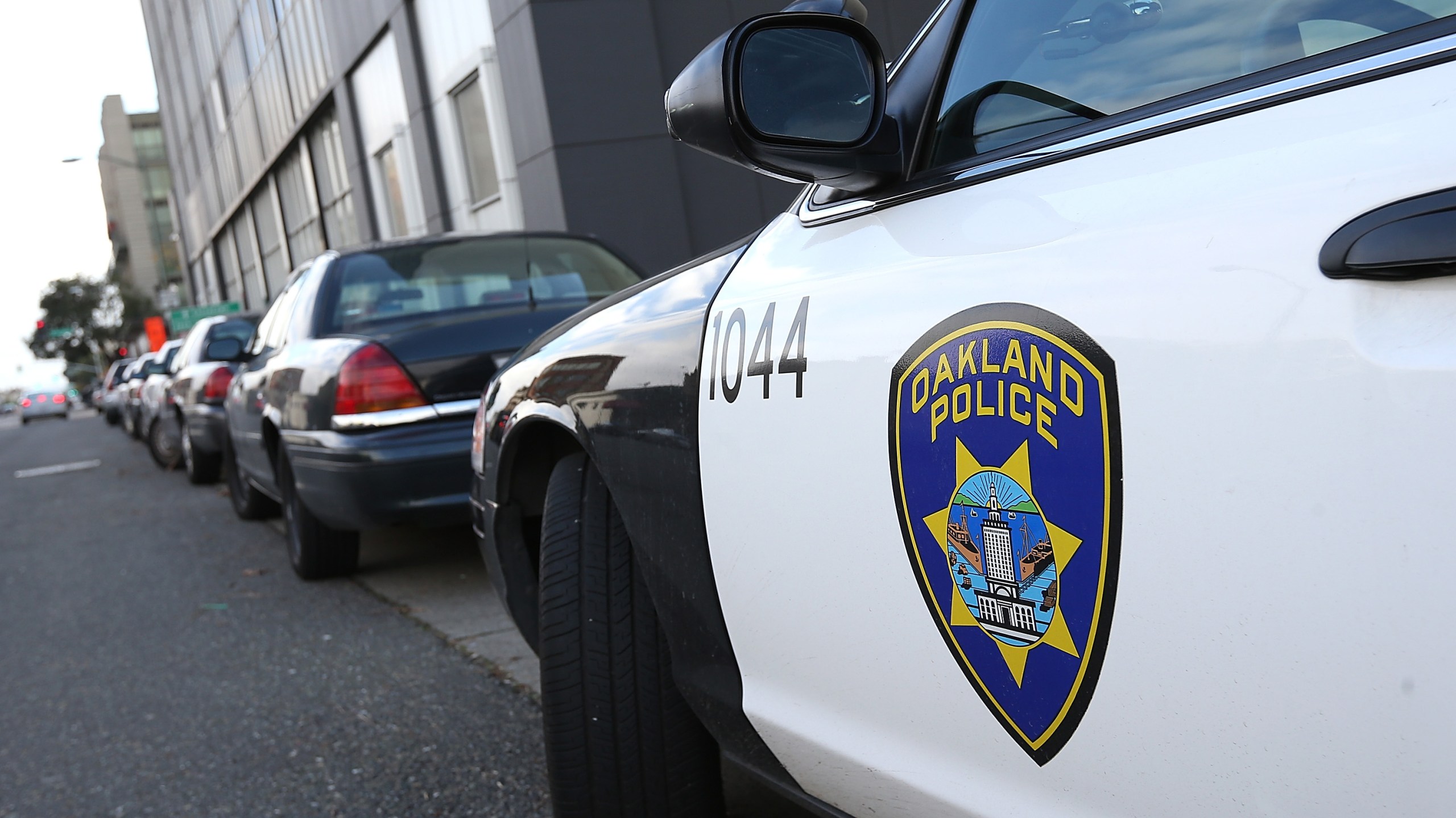 An Oakland Police patrol car sits in front of the Oakland Police headquarters on Dec. 6, 2012. (Credit: Justin Sullivan / Getty Images)