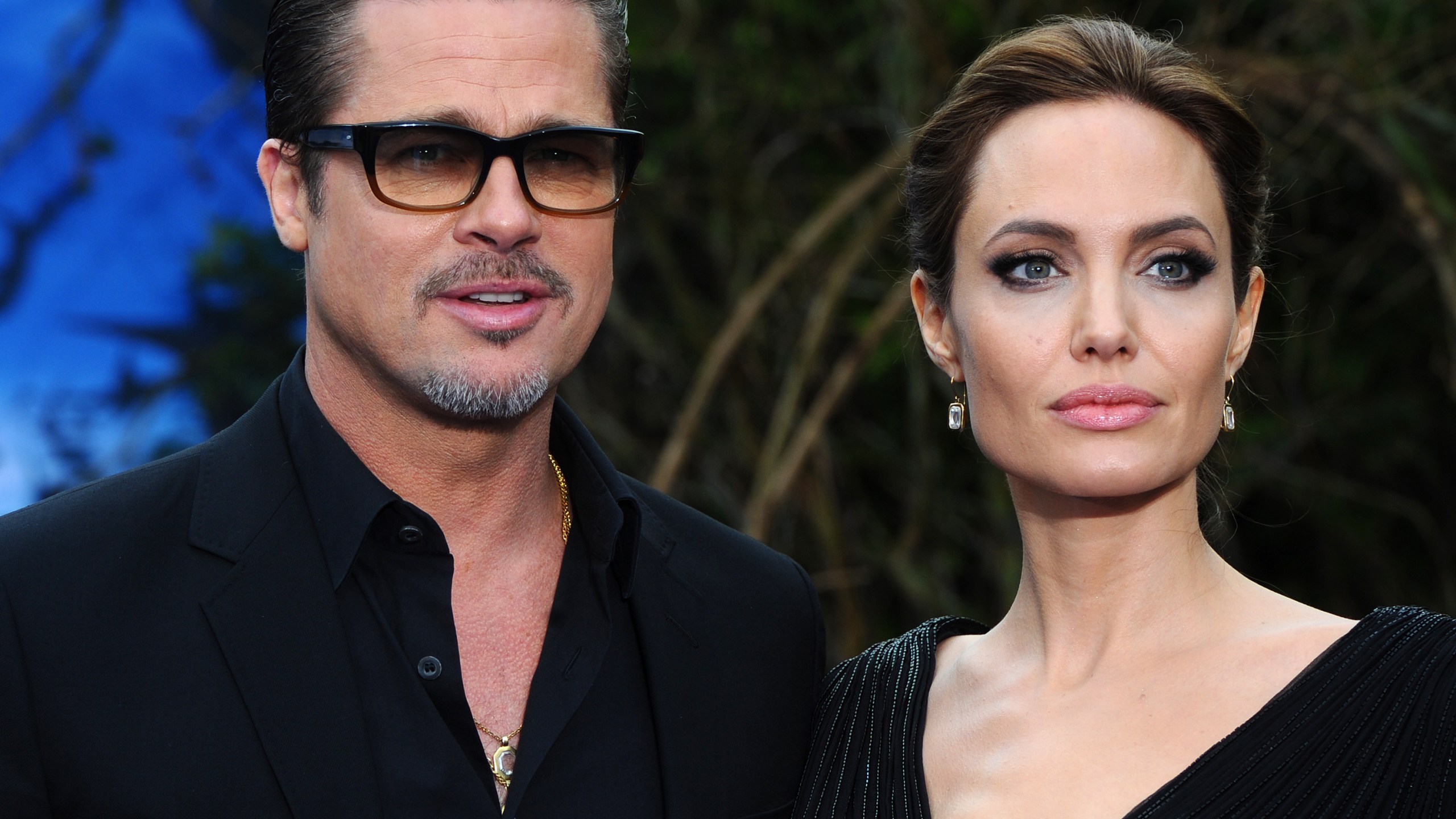 Brad Pitt and Angelina Jolie attend a private reception on May 8, 2014 in London, England. (Credit: Anthony Harvey/Getty Images)