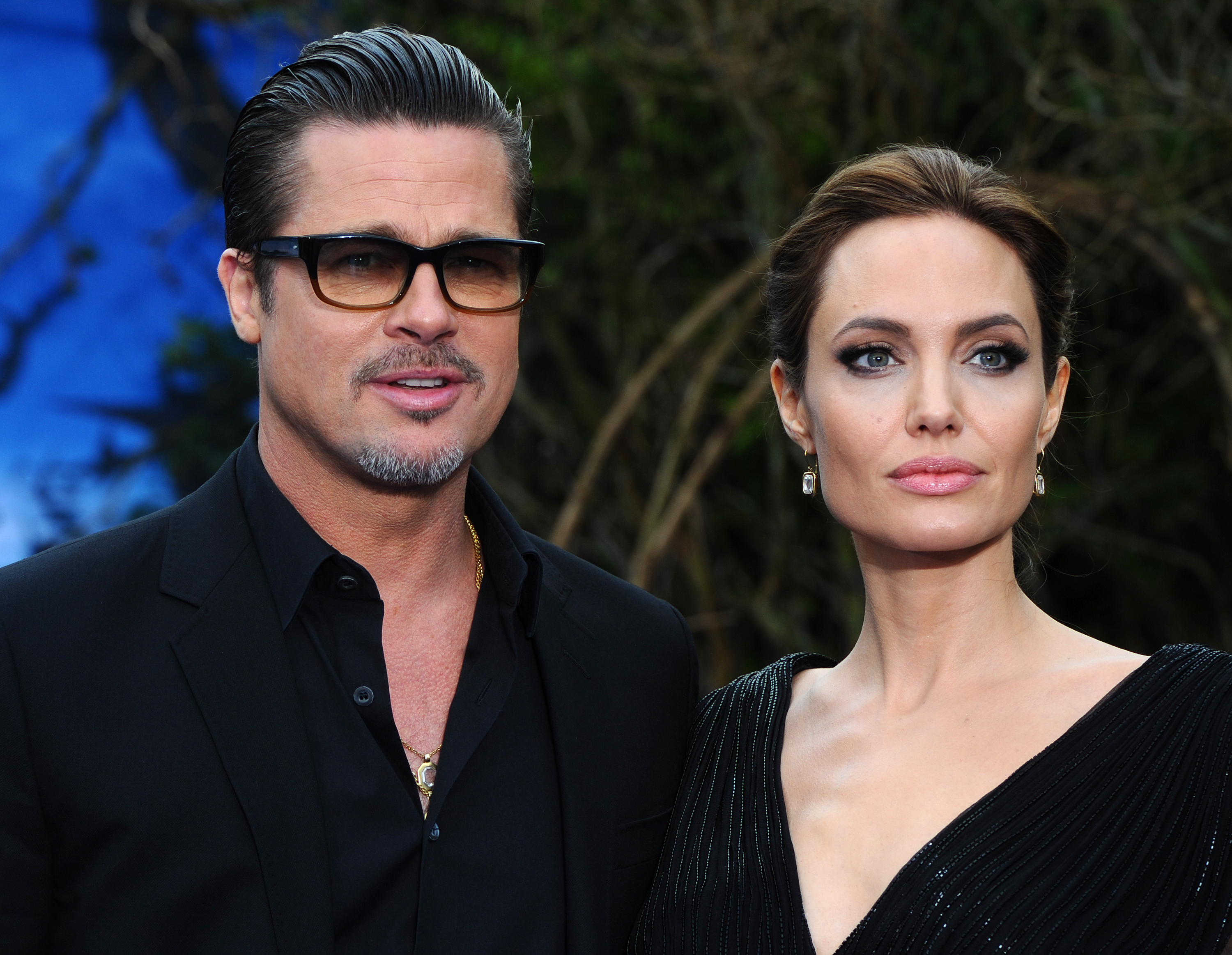 Brad Pitt and Angelina Jolie attend a private reception on May 8, 2014 in London, England. (Credit: Anthony Harvey/Getty Images)