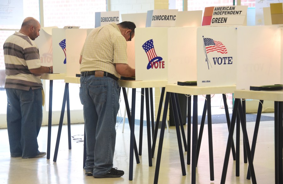 People vote at a polling station in Cudahy, California on June 7, 2016, during the California presidential primary. (Credit: