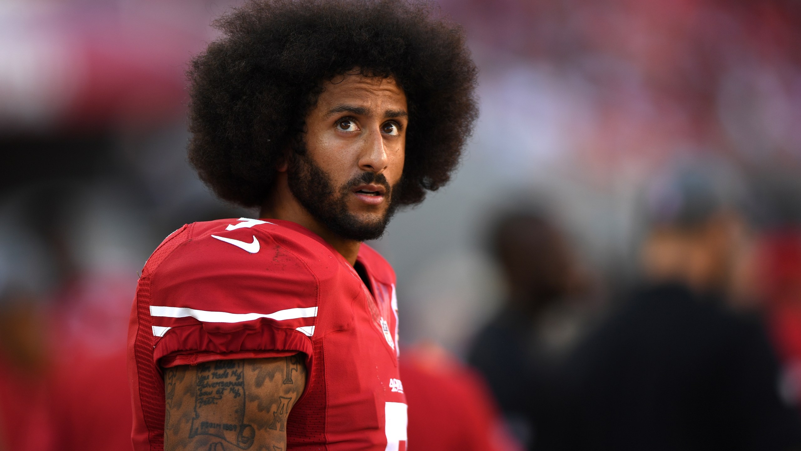 Colin Kaepernick of the San Francisco 49ers looks on from the sidelines during their NFL game against the Tampa Bay Buccaneers on October 23, 2016. (Credit: Thearon W. Henderson/Getty Images)