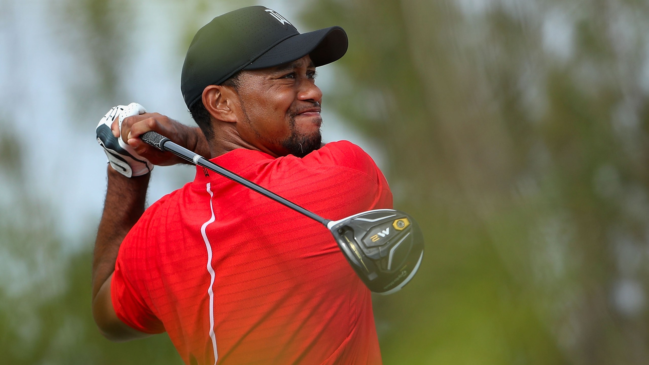 Tiger Woods hits a tee shot on the 11th hole during the final round of the Hero World Challenge on Dec. 4, 2016 in Nassau, Bahamas. (Credit: Christian Petersen/Getty Images)