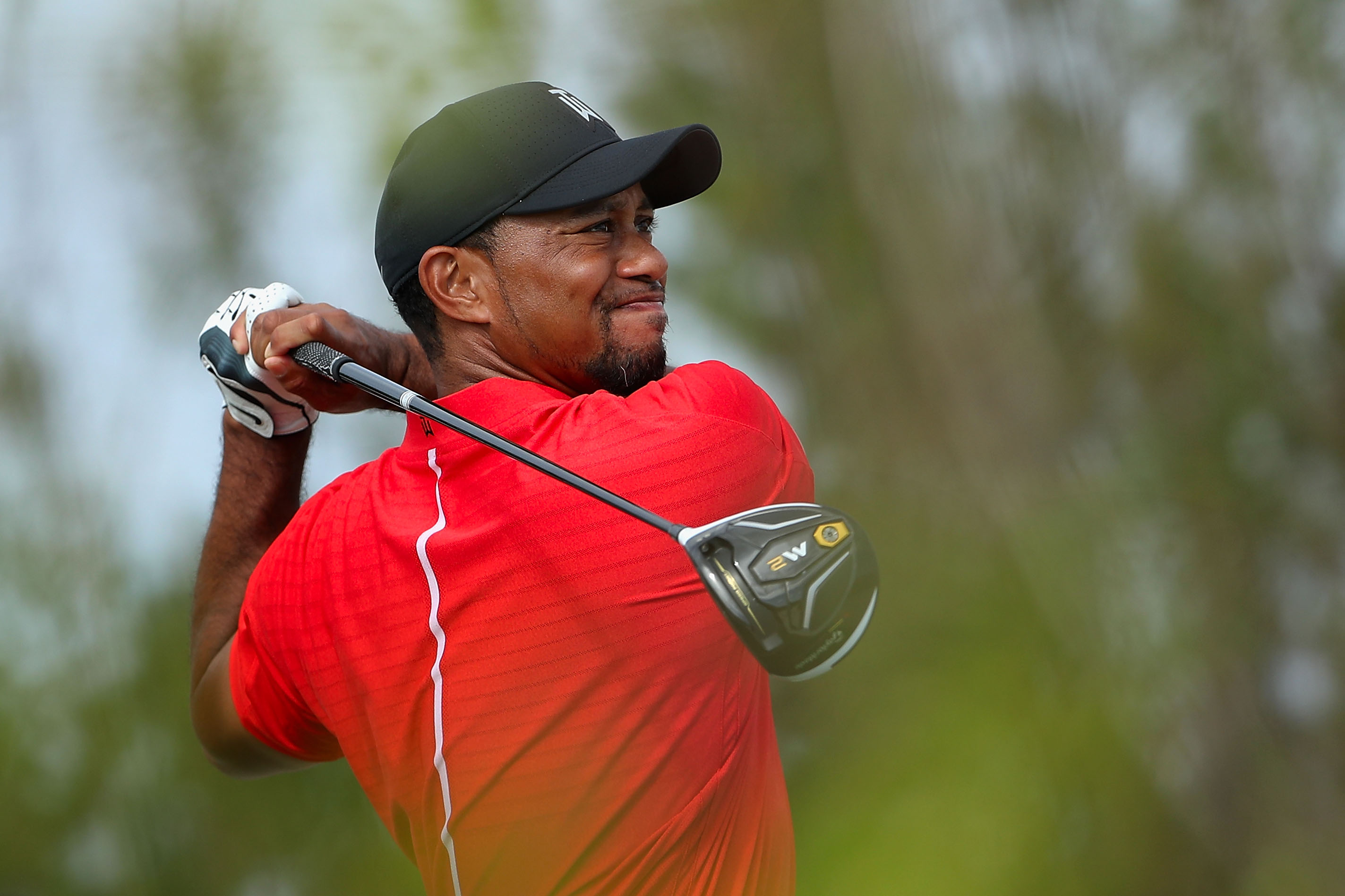 Tiger Woods hits a tee shot on the 11th hole during the final round of the Hero World Challenge on Dec. 4, 2016 in Nassau, Bahamas. (Credit: Christian Petersen/Getty Images)