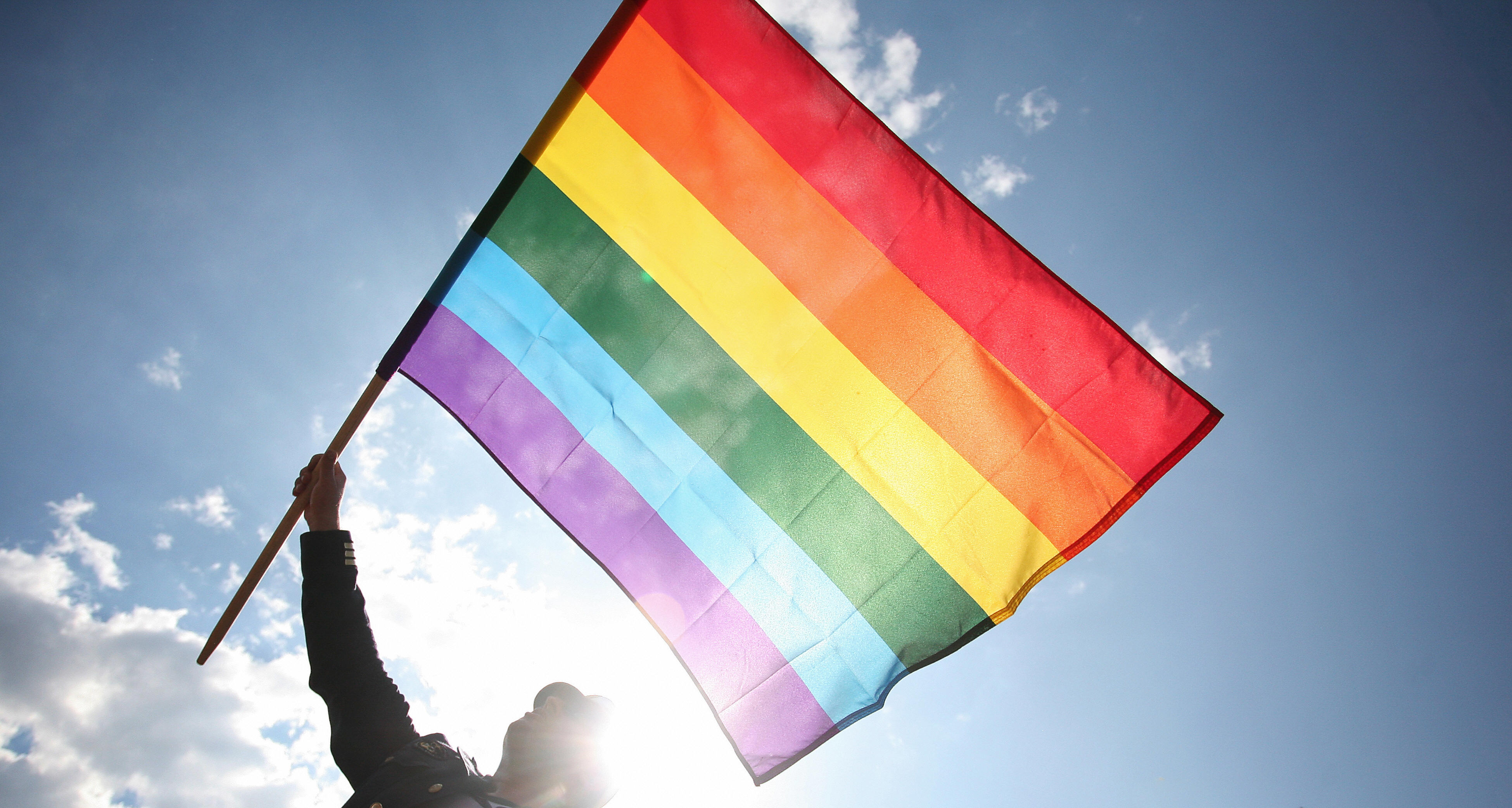 A person wave a rainbow flag as he takes part to the Gay Pride parade on June 7, 2008 in Warsaw. (Wojtek Radwanski/AFP/Getty Images)