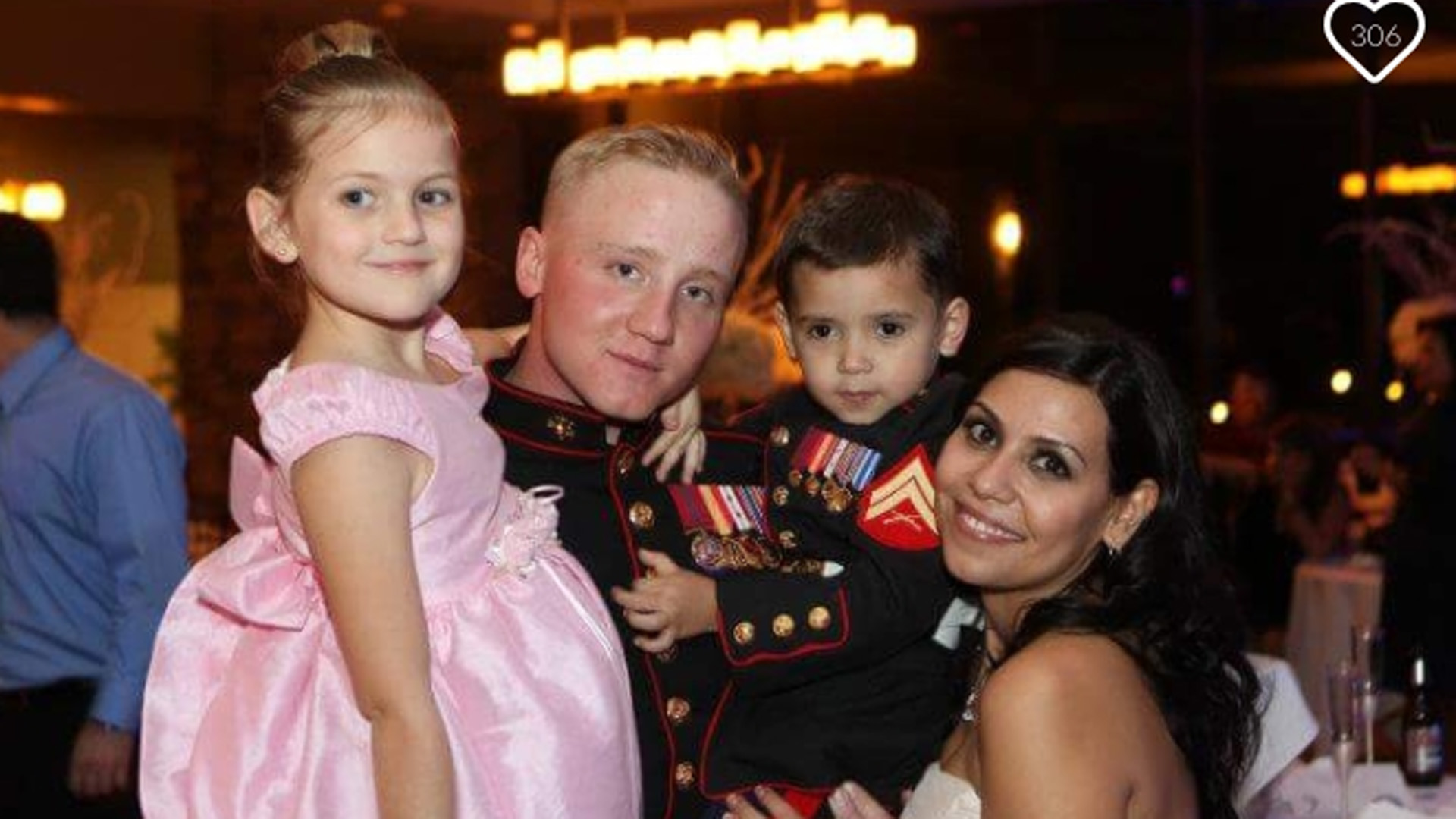 Officer Doe is shown with his family in a photo posted to a GoFundMe page.