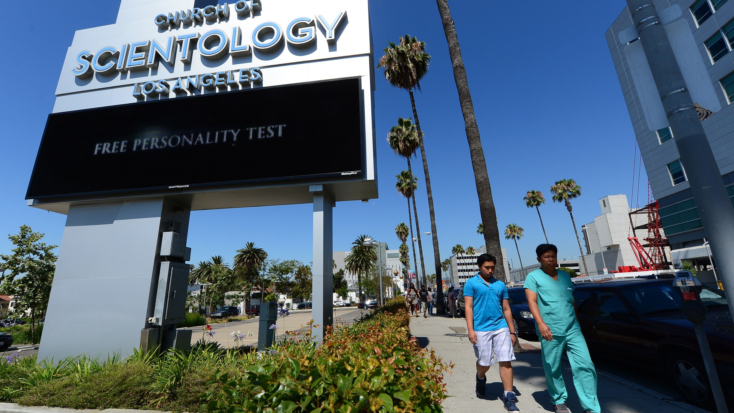 Pedestrians walk past the Church of Scientology along Sunset Boulevard in Hollywood on July 9, 2012. (Credit: FREDERIC J. BROWN/AFP/GettyImages)