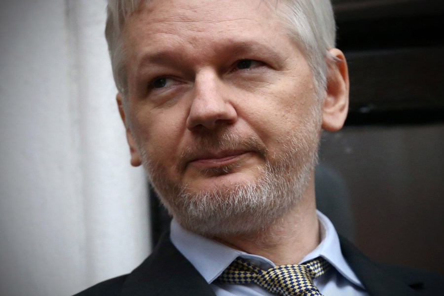 Wikileaks founder Julian Assange speaks from the balcony of the Ecuadorian embassy where he continues to seek asylum following an extradition request from Sweden in 2012, on Feb. 5, 2016, in London, England.(Credit: Carl Court / Getty Images)