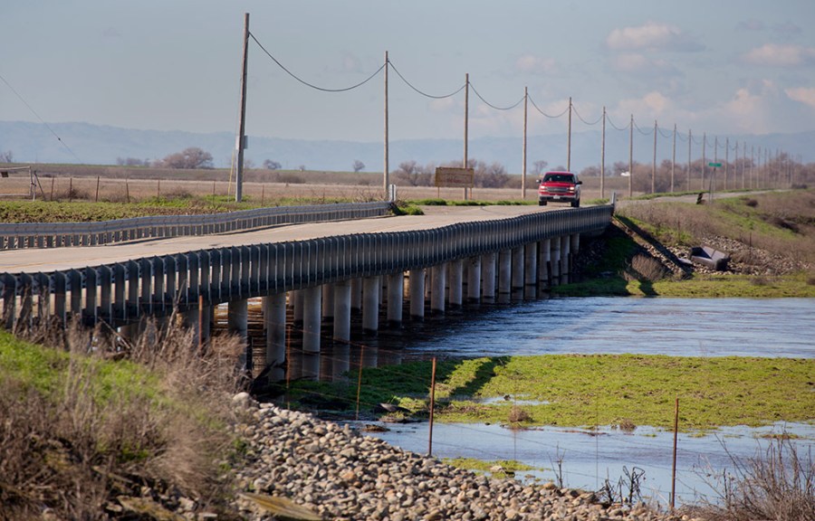 West Washington Road where it crosses the Eastside Bypass, a constructed floodway for the San Joaquin River, is shown in a state Department of Water Resources photo.