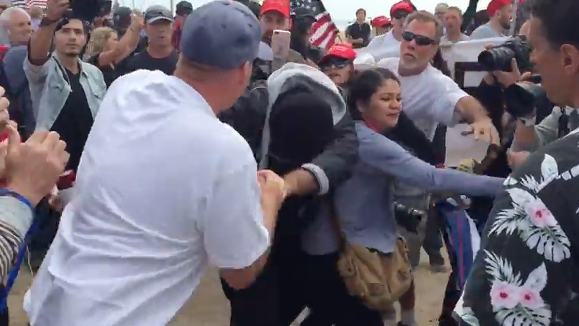 A fight broke out during a pro-Trump rally in Huntington Beach on March 25, 2017. (Credit: KTLA)