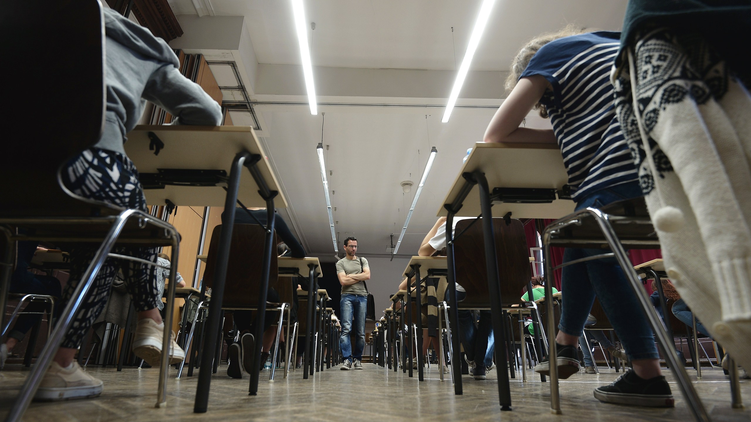 In this file picture taken on June 16, 2014, French students work on the test of philosophy as they take the baccalaureate exam at the Fustel de Coulanges high school in Strasbourg, eastern France. (Credit: FREDERICK FLORIN/AFP/Getty Images)