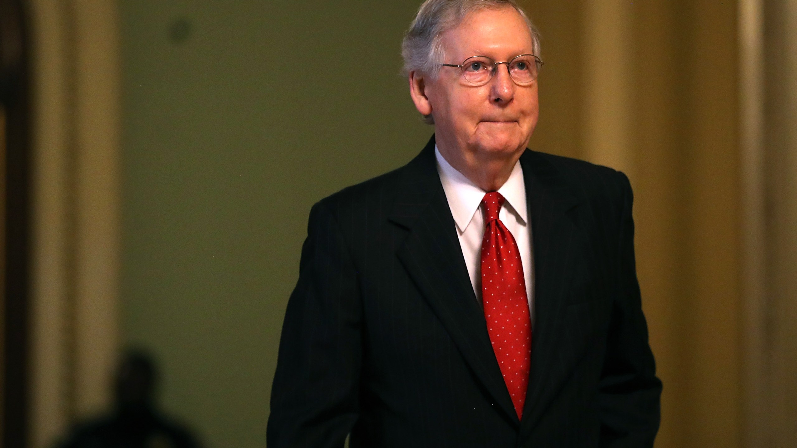 Senate Majority Leader Mitch McConnell walks to his office on July 26, 2017, in Washington, D.C. (Credit: Justin Sullivan/Getty Images)