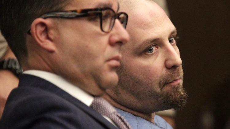 Aramazd Andressian Sr., right, sits with his lawyer, Ambrosio Rodriguez, on Aug. 23, 2017, as he was sentenced to 25 years to life in prison for murdering his 5-year-old son. (Credit: Irfan Khan / Los Angeles Times)