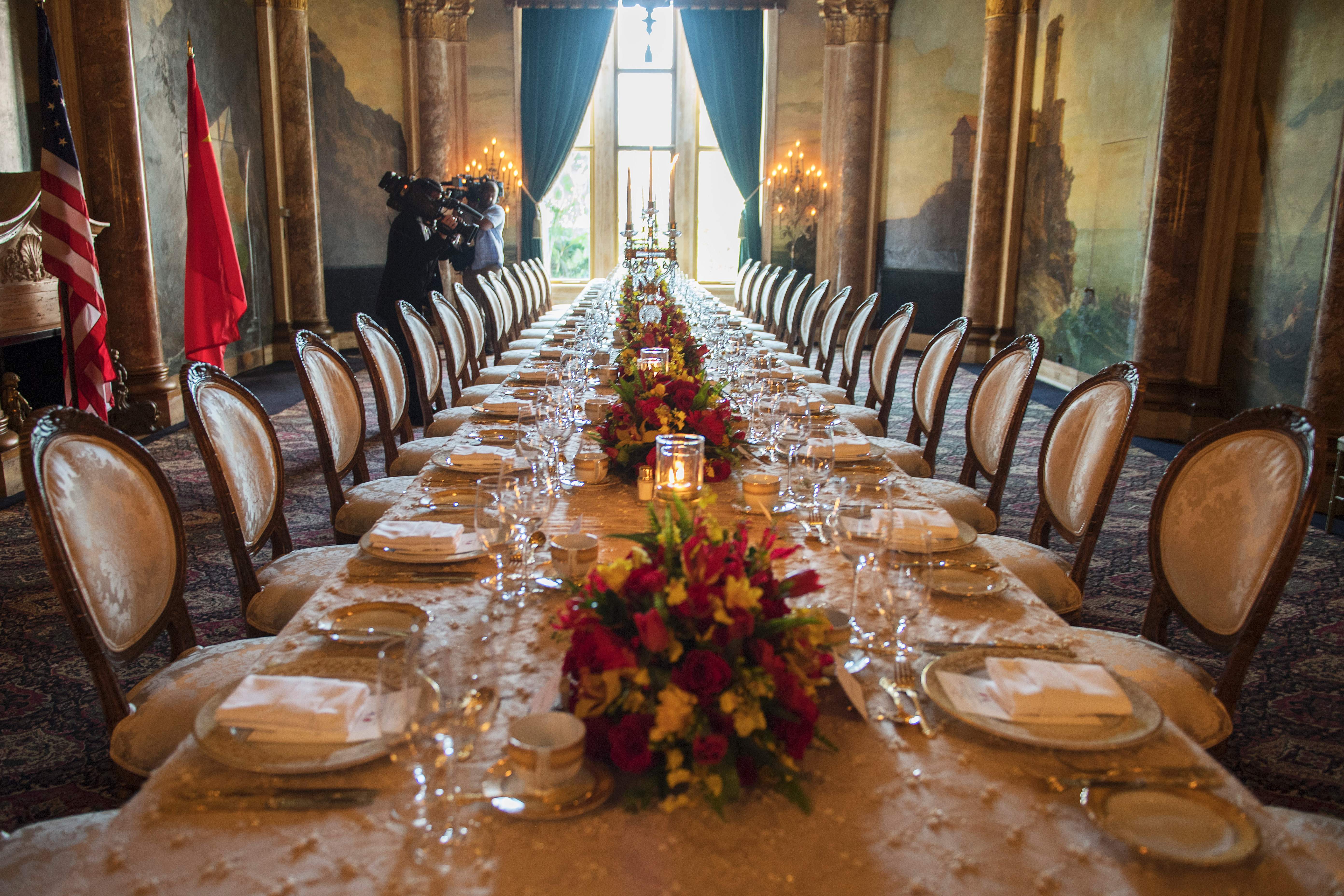 A set table at the Mar-a-Lago estate in West Palm Beach, Florida, on April 6, 2017. (Credit: Jim Watson/AFP/Getty Images)