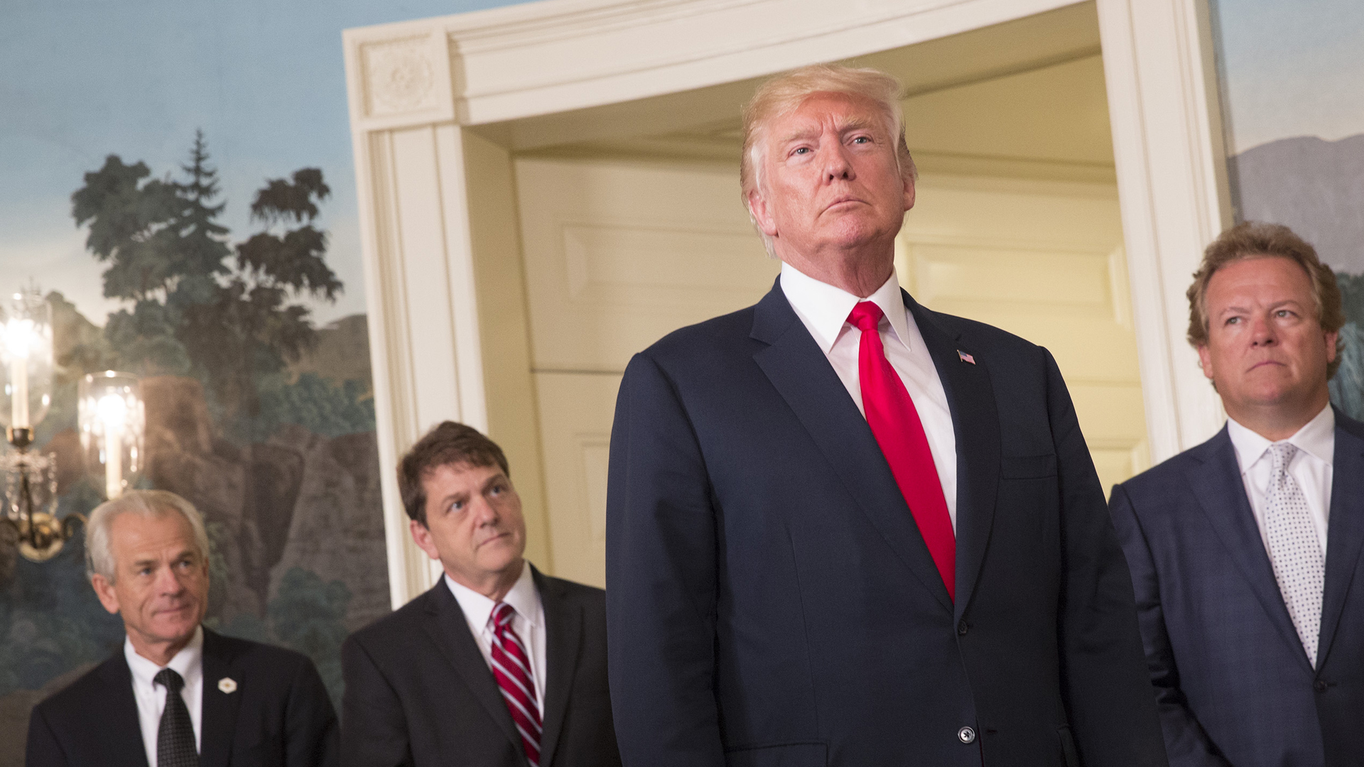 President Donald Trump appears alongside advisers in the White House on August 14, 2017.(Credit: Chris Kleponis-Pool/Getty Images)