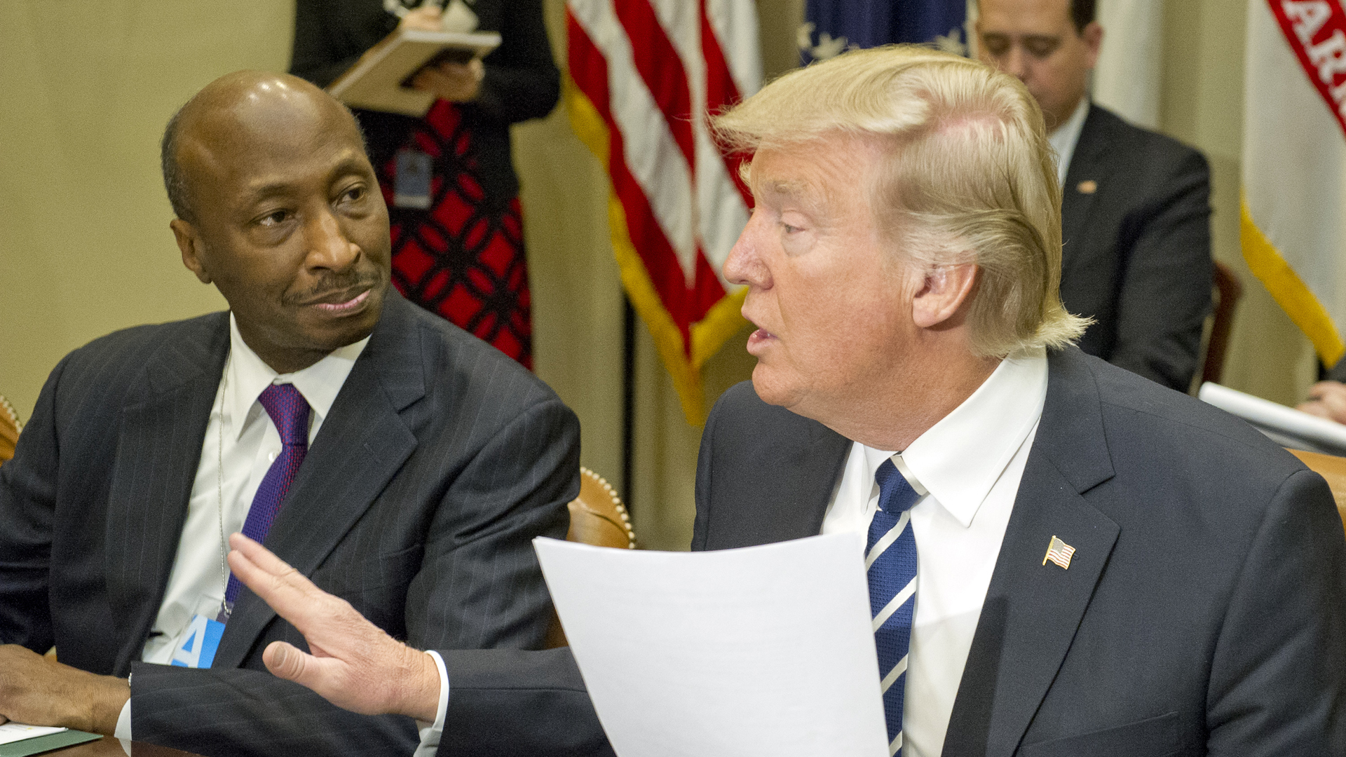 President Donald Trump and Merck CEO Kenneth C. Frazier sat next to each when the president met with representatives of the Pharmaceutical Research and Manufacturers of America in the Roosevelt Room of the White House on Jan. 31, 2017 in Washington, DC. (Credit: Ron Sachs - Pool/Getty Images)