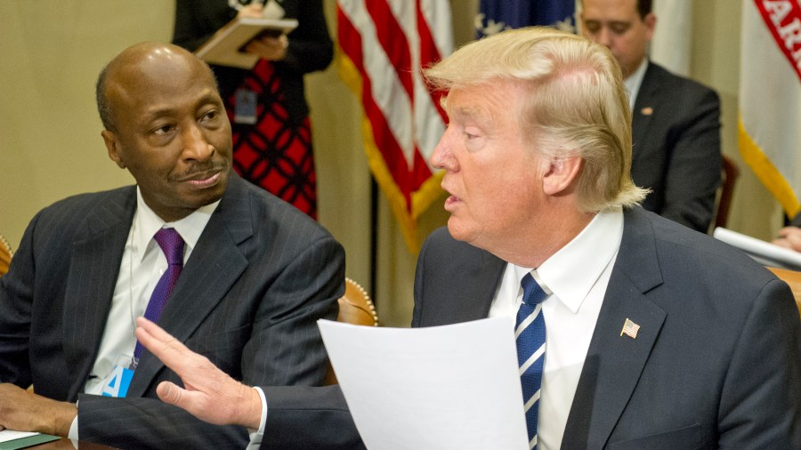 President Donald Trump and Merck CEO Kenneth C. Frazier sat next to each when the president met with representatives of the Pharmaceutical Research and Manufacturers of America in the Roosevelt Room of the White House on Jan. 31, 2017 in Washington, DC. (Credit: Ron Sachs - Pool/Getty Images)