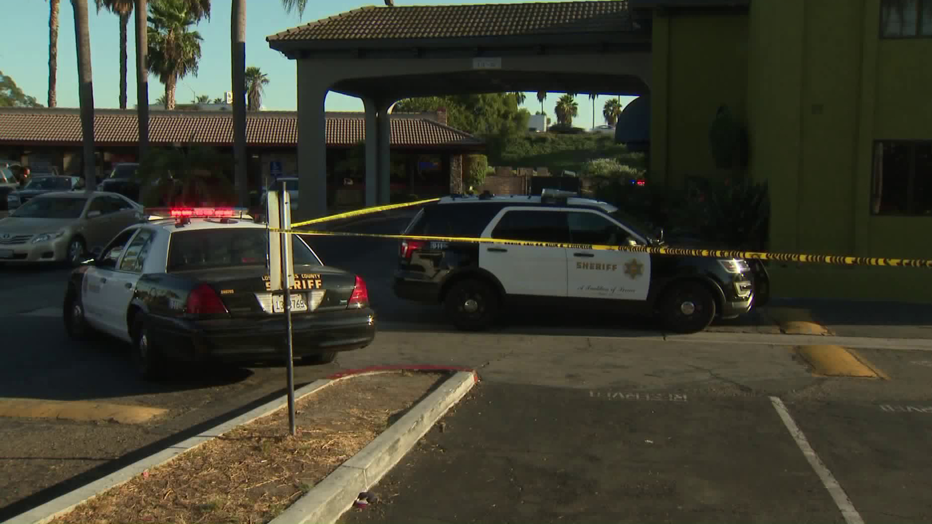 Police cordon off an area of a hotel in Artesia to investigate a suspicious death on Sept. 29, 2017. (Credit: KTLA)