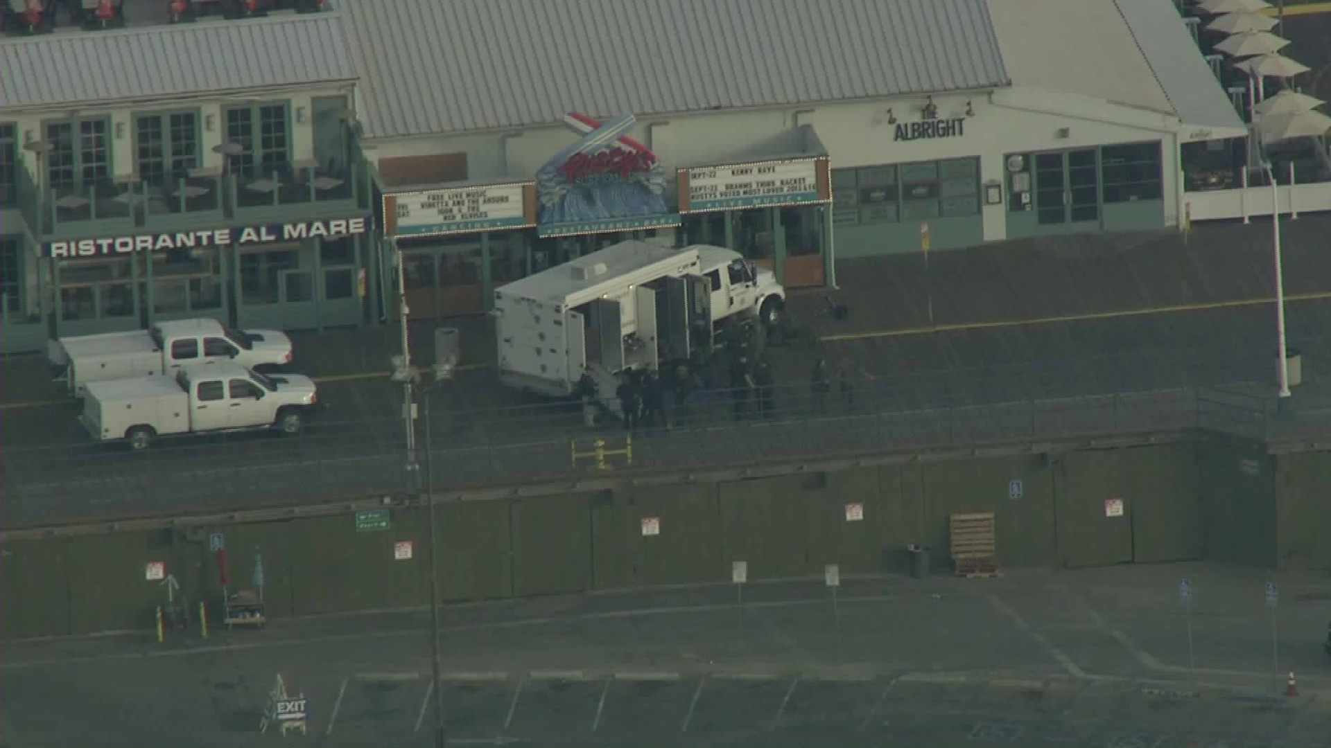 Officials respond to a bomb threat at the Santa Monica Pier on Sept. 11, 2017 and pedestrian traffic was cleared from the area. (Credit: KTLA)