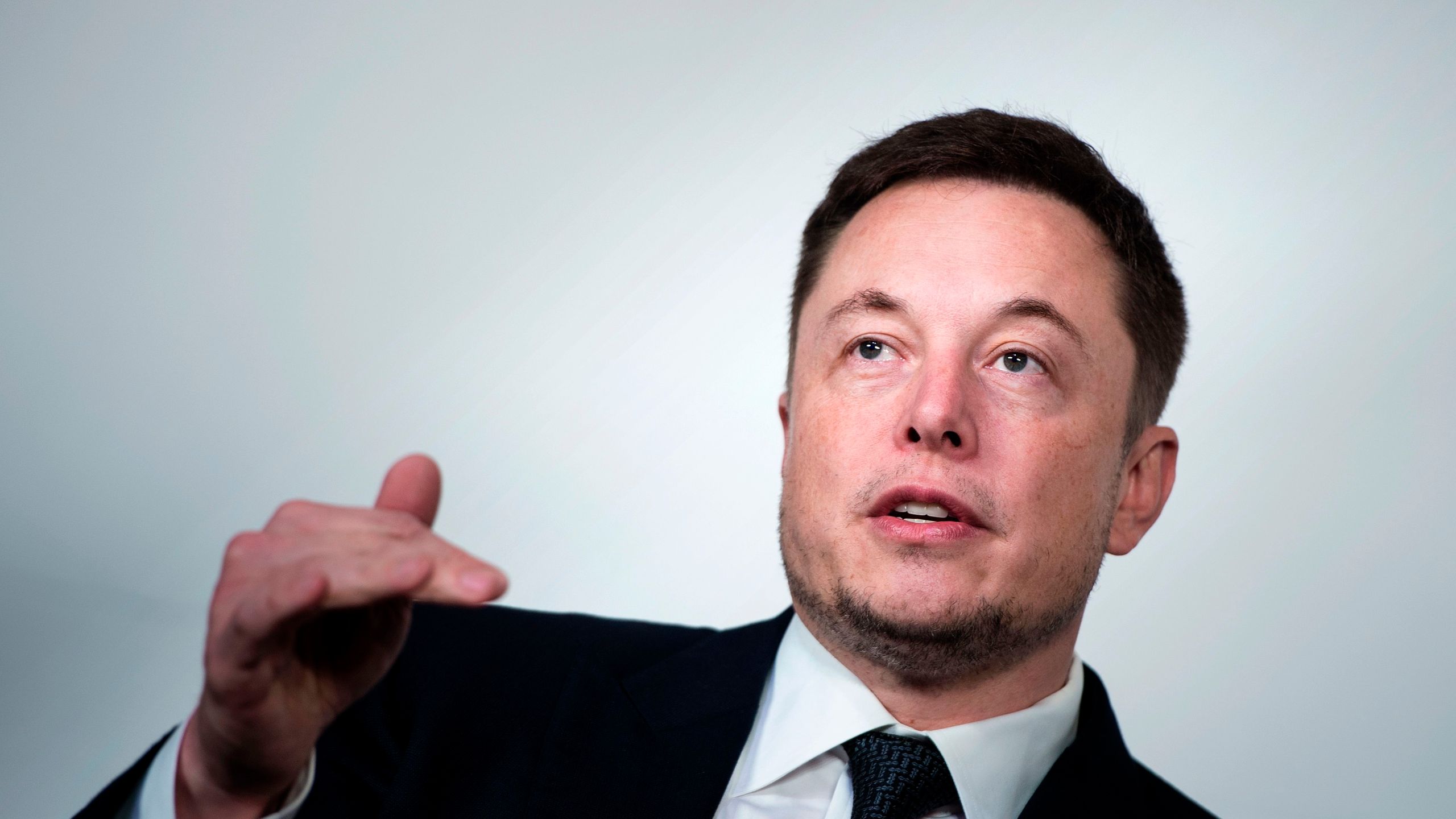 Elon Musk, CEO of SpaceX and Tesla, speaks during the International Space Station Research and Development Conference at the Omni Shoreham Hotel July 19, 2017 in Washington, DC. (Credit: BRENDAN SMIALOWSKI/AFP/Getty Images)