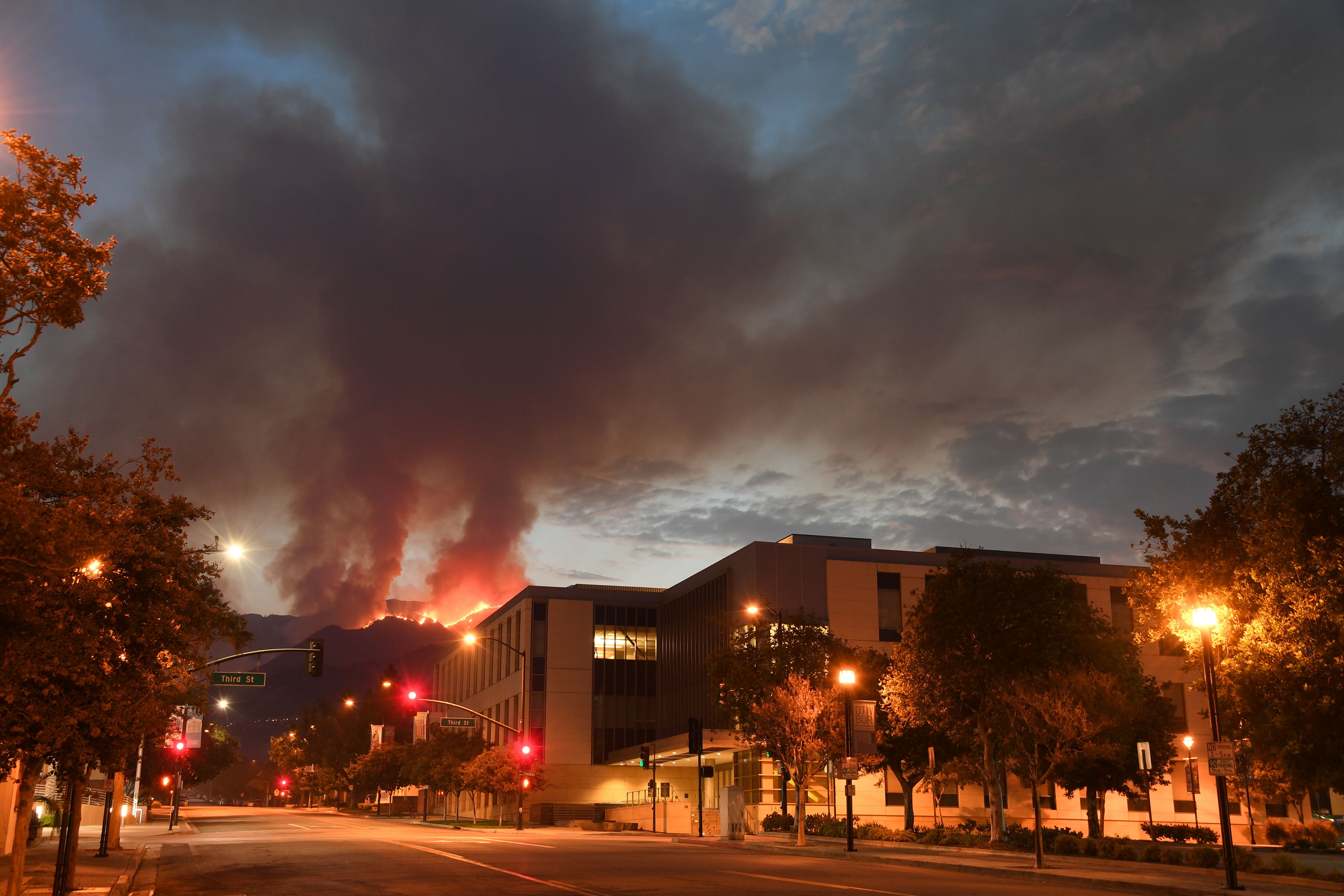 The La Tuna fire burns above downtown Burbank on Sept. 3, 2017. (Credit: Robyn Beck / AFP / Getty Images)