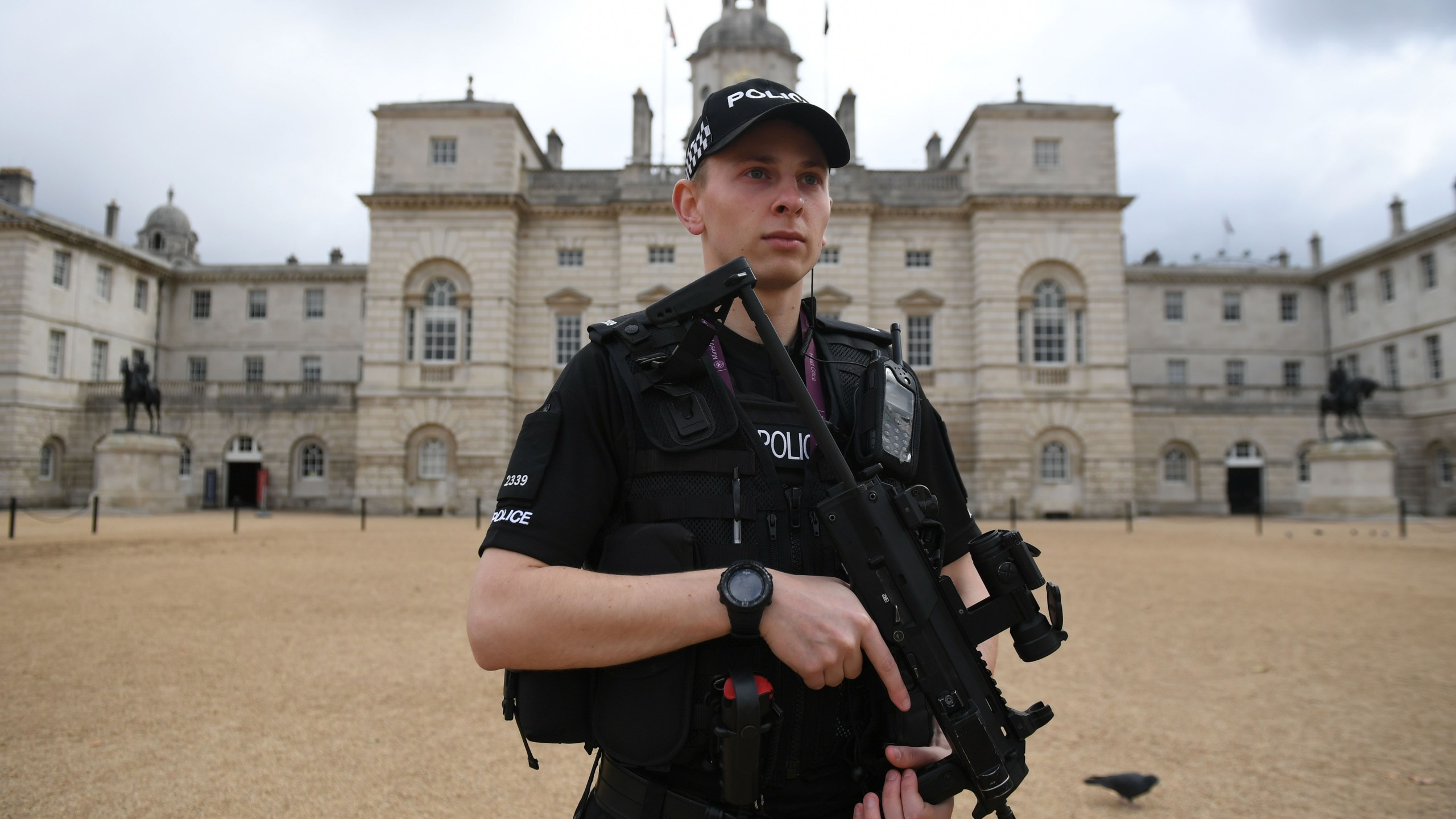 An armed police officer stands guard outside the Horse Guards Parade in central London on Sept. 16, 2017. (Credit: Chris J. Ratcliffe / AFP / Getty Images)