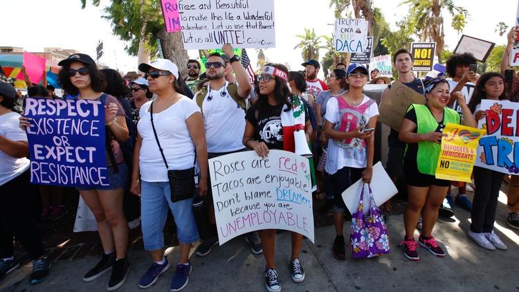 A few hundred immigrants rights activists rallied in MacArthur Park on September 10, 2017 to protest President Trump's immigration policies. (Credit; Francine Orr / Los Angeles Times)