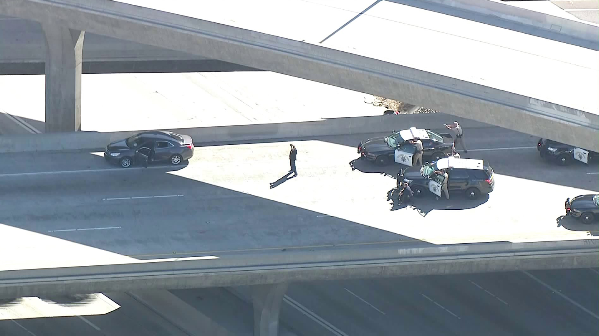 A pursuit driver surrenders on the 118 Freeway on Oct. 23, 2017. (Credit: KTLA)