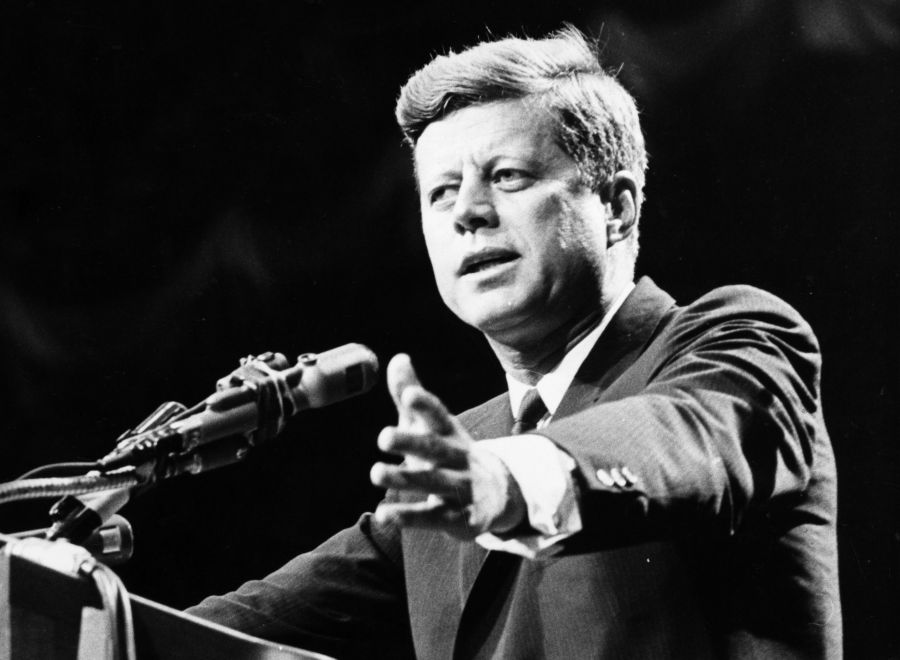 U.S. statesman John F Kennedy, 35th president of the U.S.A., making a speech. (Credit: Central Press/Getty Images)