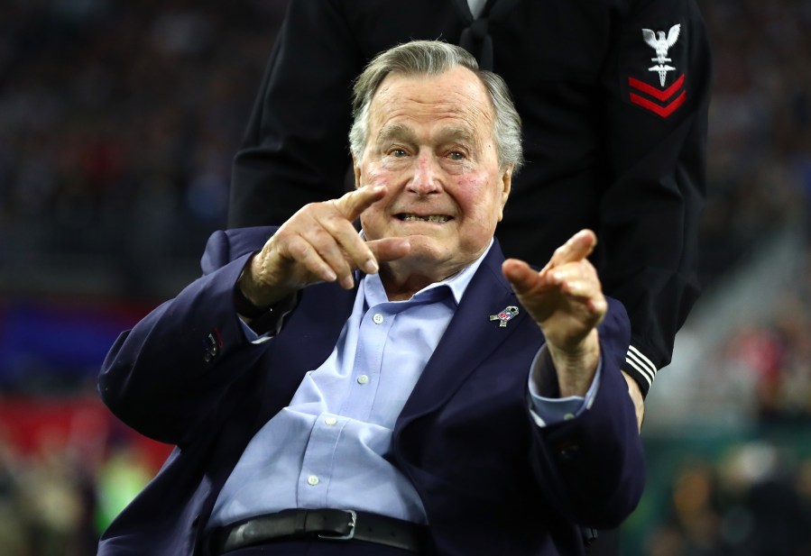 Former President George H.W. Bush arrives for the coin toss prior to Super Bowl 51 between the Atlanta Falcons and the New England Patriots at NRG Stadium on February 5, 2017 in Houston. (Credit: Al Bello/Getty Images)