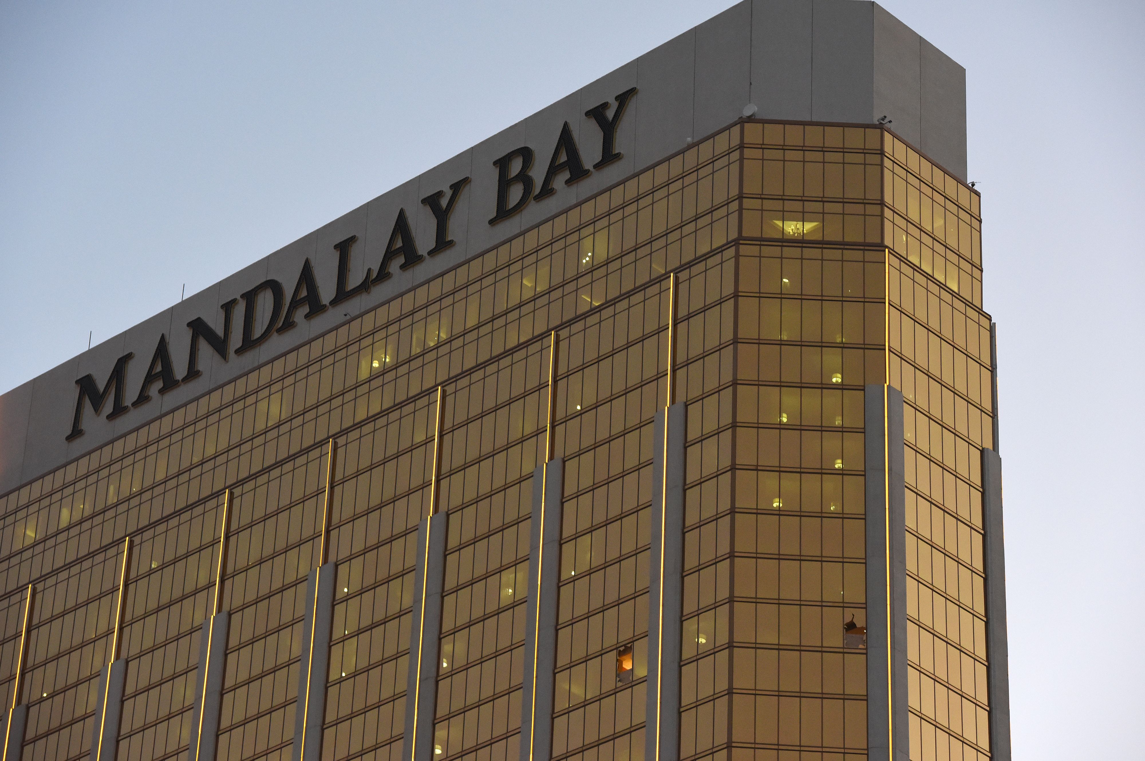 Broken windows that a gunman fired from at the Mandalay Bay Hotel and Casino in Las Vegas, Nevada, are seen Oct. 4, 2017. (Credit: Robyn Beck / AFP / Getty Images)