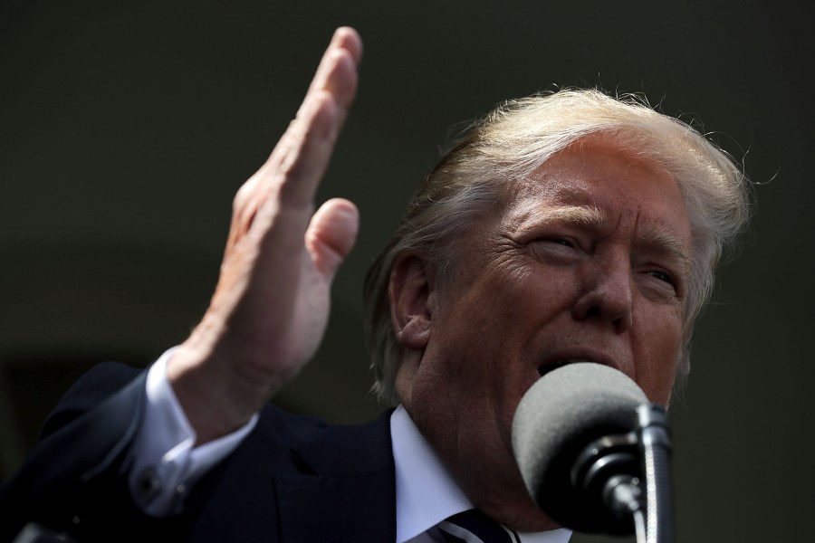 President Donald Trump speaks to reporters in the Rose Garden during a news conference with Senate Majority Leader Mitch McConnell Oct. 16, 2017. (Credit: Chip Somodevilla/Getty Images)