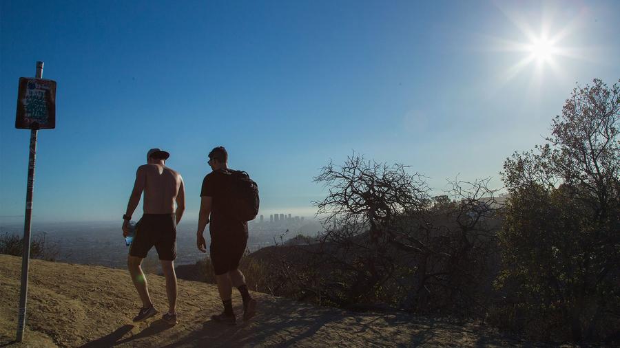 Hikers walk along a rugged trail that is under a red flag warning on Oct. 6, 2017. (Credit: Gina Ferazzi / Los Angeles Times)