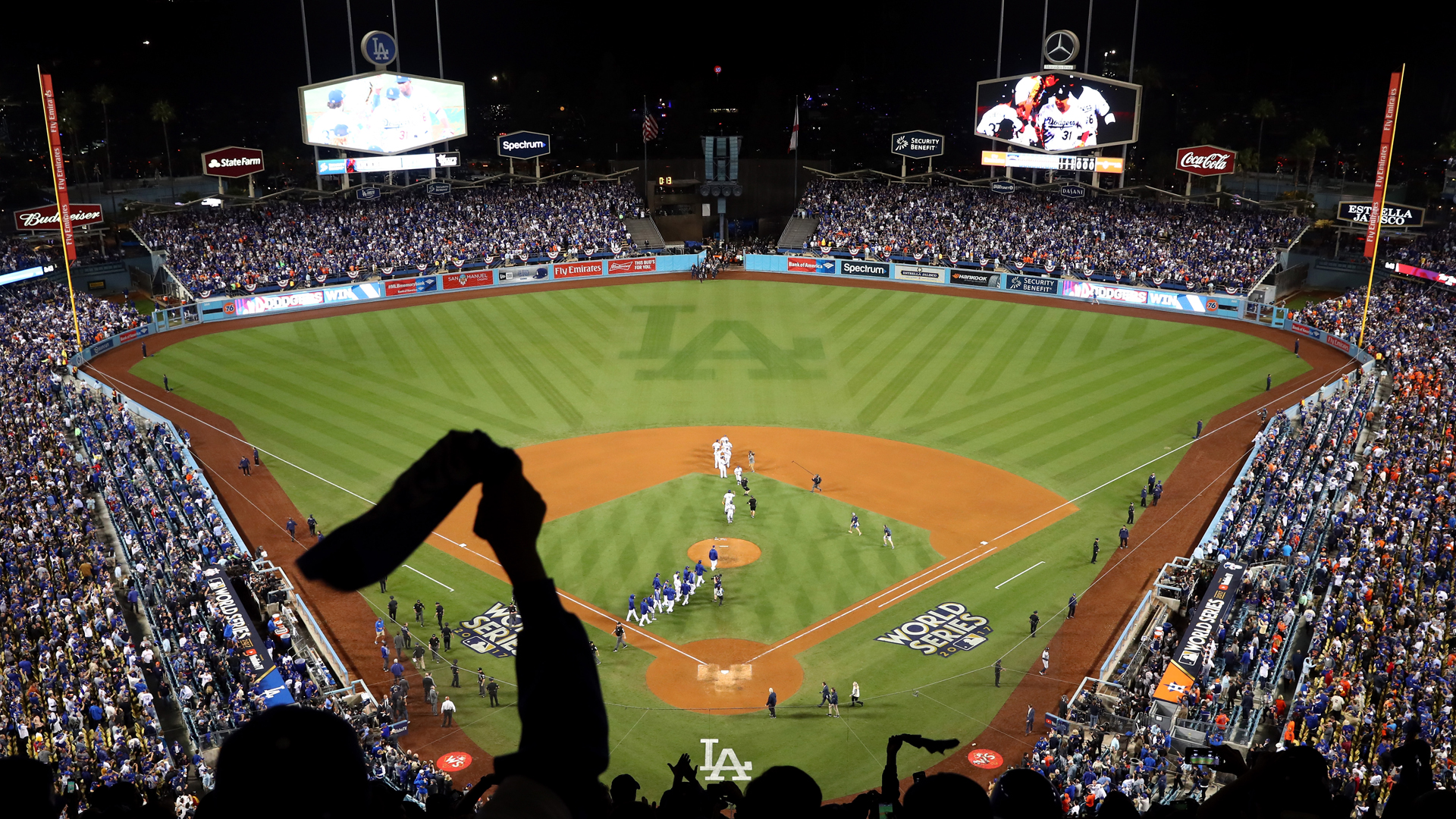 The Dodgers celebrate after defeating the Houston Astros 3-1 in game six of the 2017 World Series at Dodger Stadium on October 31, 2017 in Los Angeles. (Credit: Joe Scarnici/Getty Images)