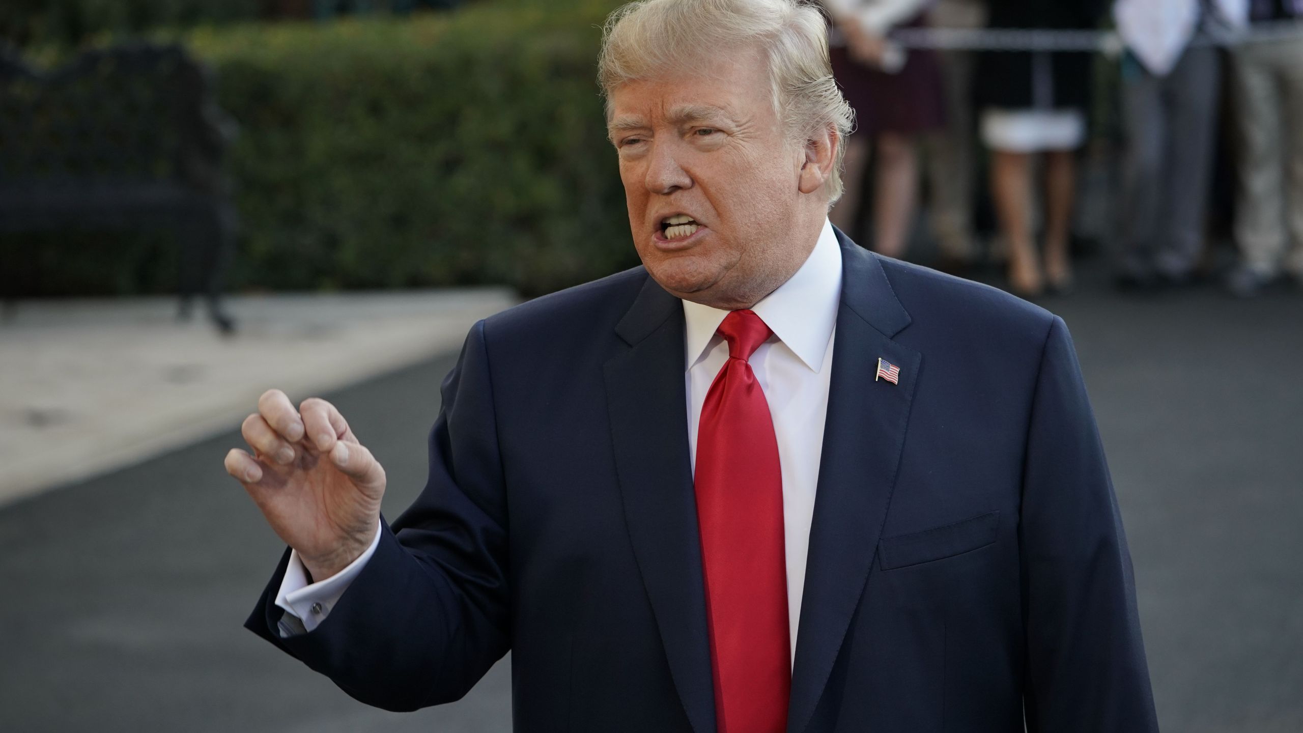 US President Donald Trump talks to reporters November 3, 2017 at the White House in Washington before departing for a 12-day trip to Asia. (Credit: MANDEL NGAN/AFP/Getty Images)