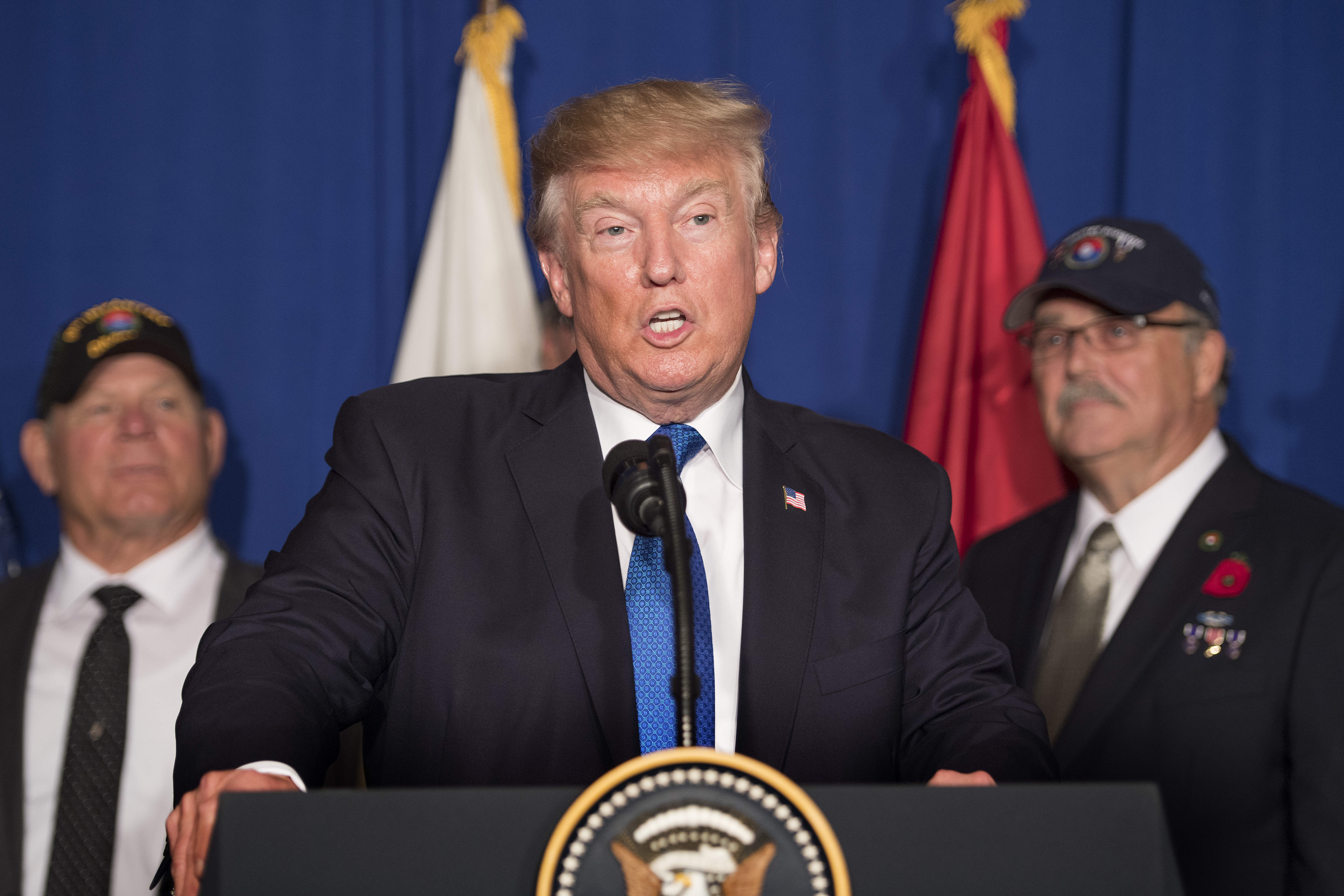 US President Donald Trump participates in a veterans meet and greet on the sidelines of the Asia-Pacific Economic Cooperation (APEC) leaders' summit in the central Vietnamese city of Danang on November 10, 2017. (Credit: JIM WATSON/AFP/Getty Images)