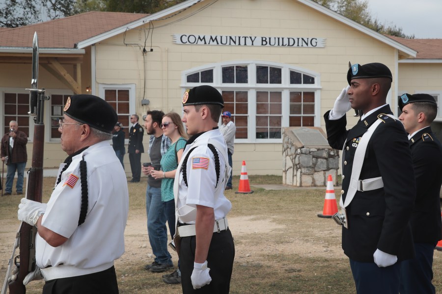 Residents and visitors attend a Veterans Day ceremony outside the community center in Sutherland Springs, Texas, on Nov. 11, 2017. (Credit: Scott Olson / Getty Images)