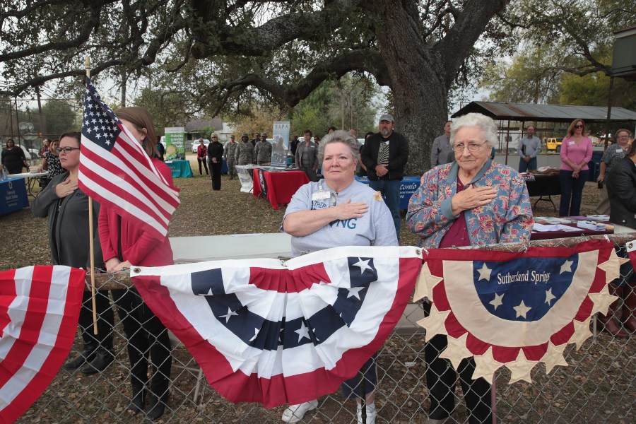 Residents and visitors attend a Veterans Day ceremony outside the community center in Sutherland Springs, Texas, on Nov. 11, 2017. (Credit: Scott Olson / Getty Images)