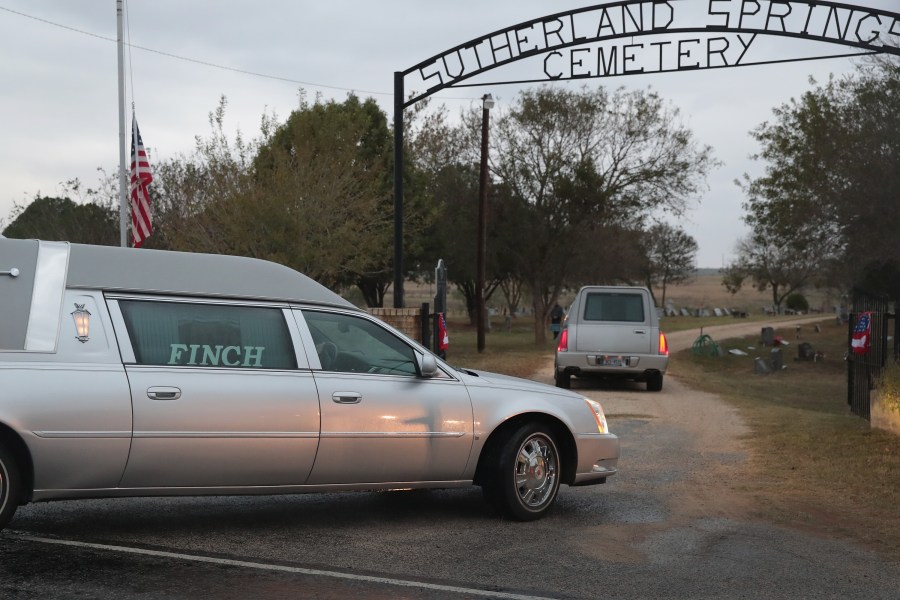 Hearses carrying the remains of Ricardo Rodriguez and his wife Therese arrive at the Sutherland Springs Cemetery on Nov. 11, 2017. (Credit: Scott Olson / Getty Images)