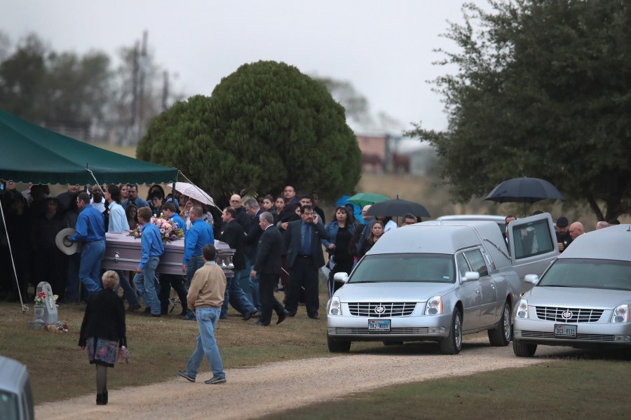 The remains of Ricardo Rodriguez and his wife Therese arrive at the Sutherland Springs Cemetery on Nov. 11, 2017. (Credit: Scott Olson / Getty Images)