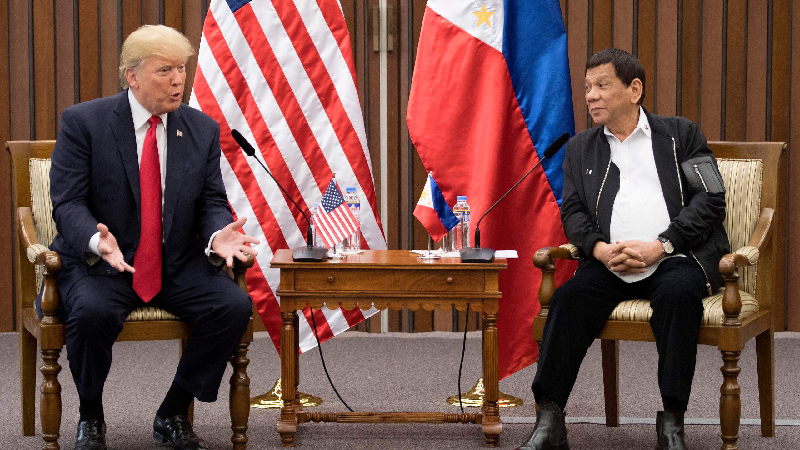 U.S. President Donald Trump talks with Philippine President Rodrigo Duterte during their bilateral meeting on the side line of the ASEAN Summit in Manila on Nov. 13, 2017. (Credit: Jim Watson / AFP / Getty Images)