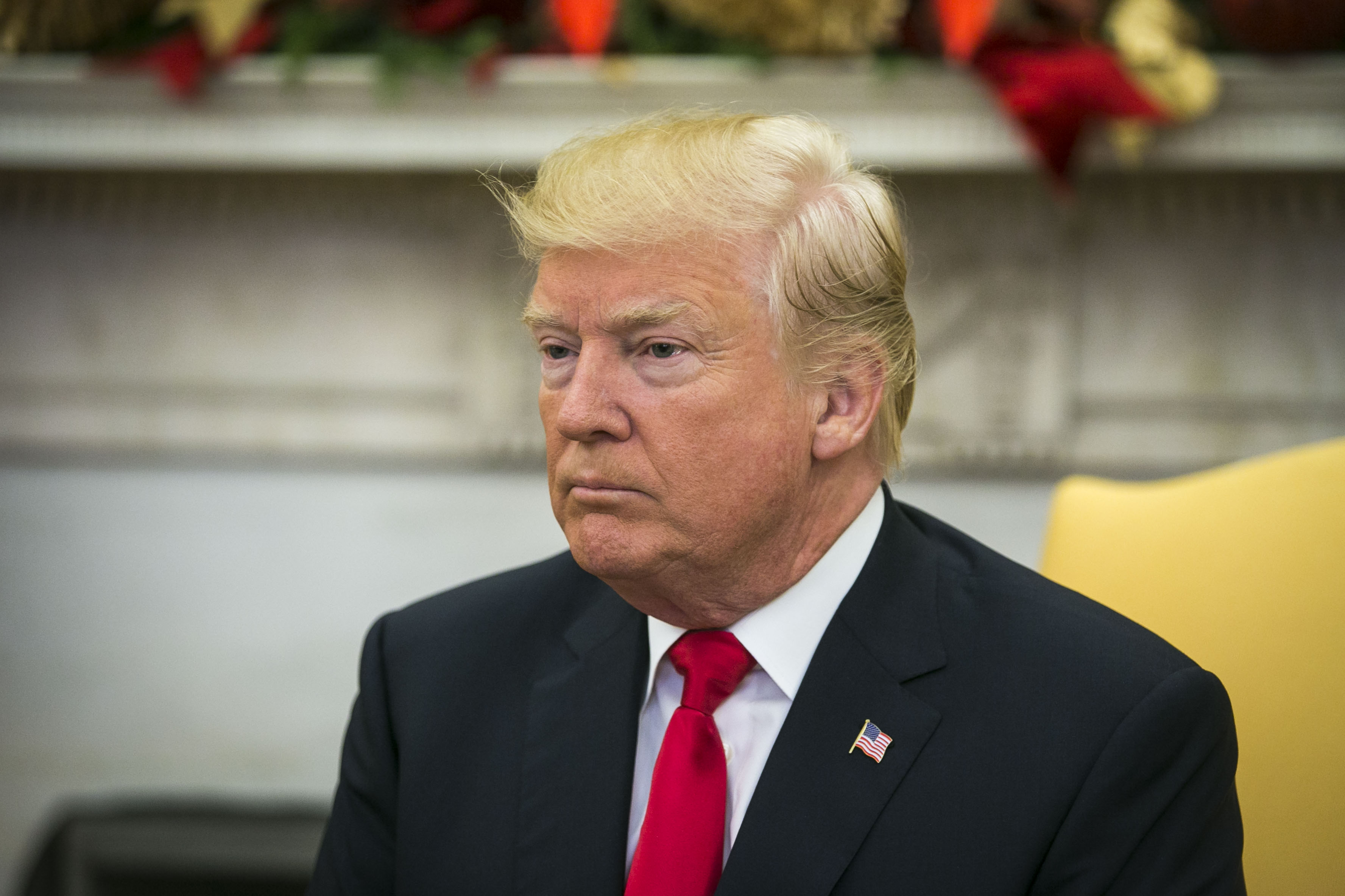 President Donald Trump is seen on Nov. 30, 2017, in the Oval Office at the White House. (Credit: Al Drago / Getty Images)