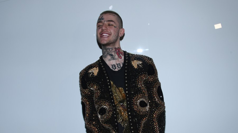 Lil Peep attended the Balmain Menswear Spring/Summer 2018 show as part of Paris Fashion Week on June 24, 2017 in Paris. (Credit: Pascal Le Segretain/Getty Images)