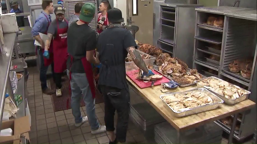 Volunteers prepare thousands of Thanksgiving meals on Nov. 22, 2107. (Credit: KTLA)