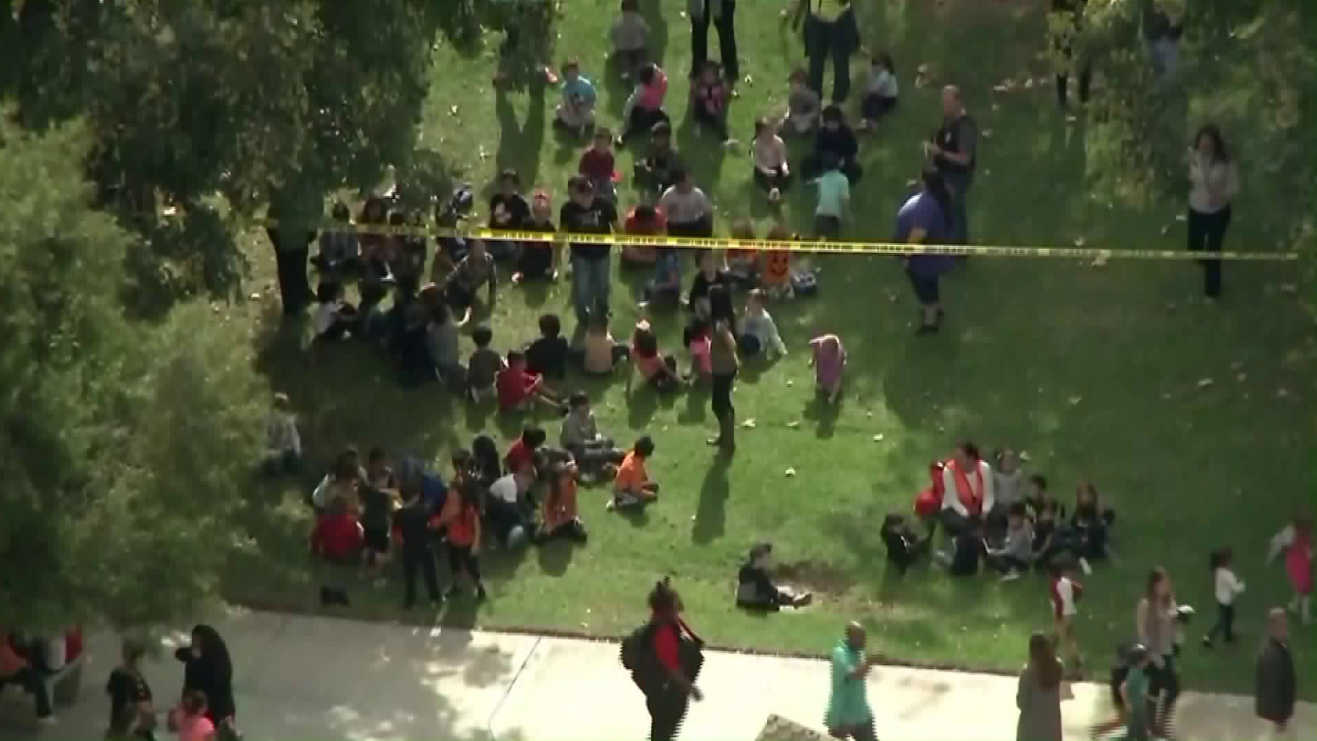 Students at Castleview Elementary School are evacuated after one of their teachers was taken hostage in a classroom on Oct. 31, 2017. (Credit: KTLA)